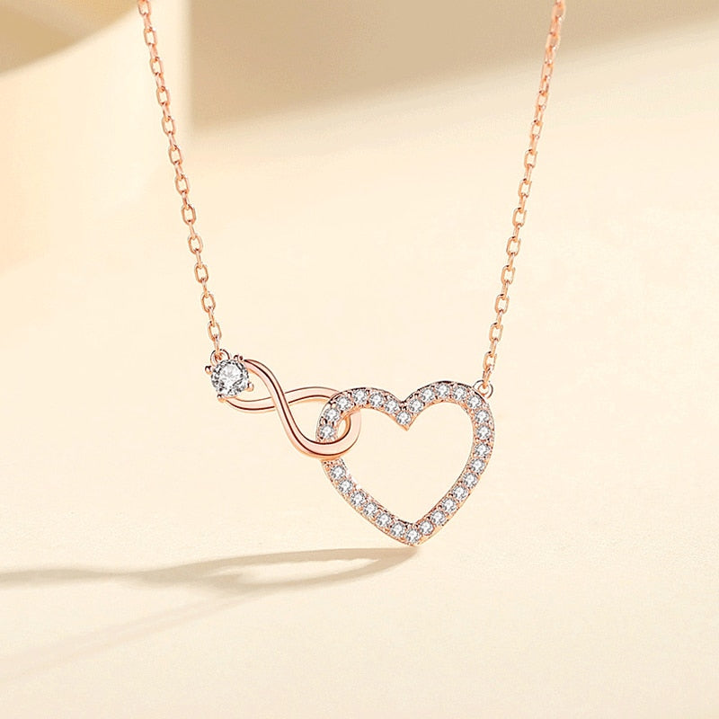Necklace adorned with a heart and an infinity symbol