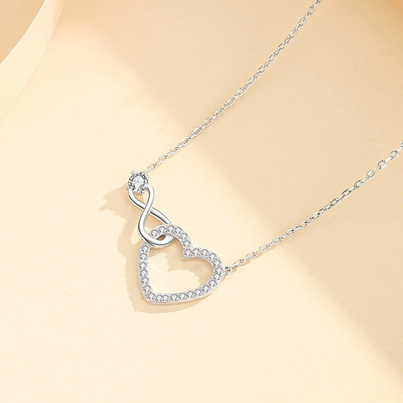 Necklace adorned with a heart and an infinity symbol