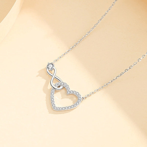 Necklace adorned with a heart and an infinity symbol